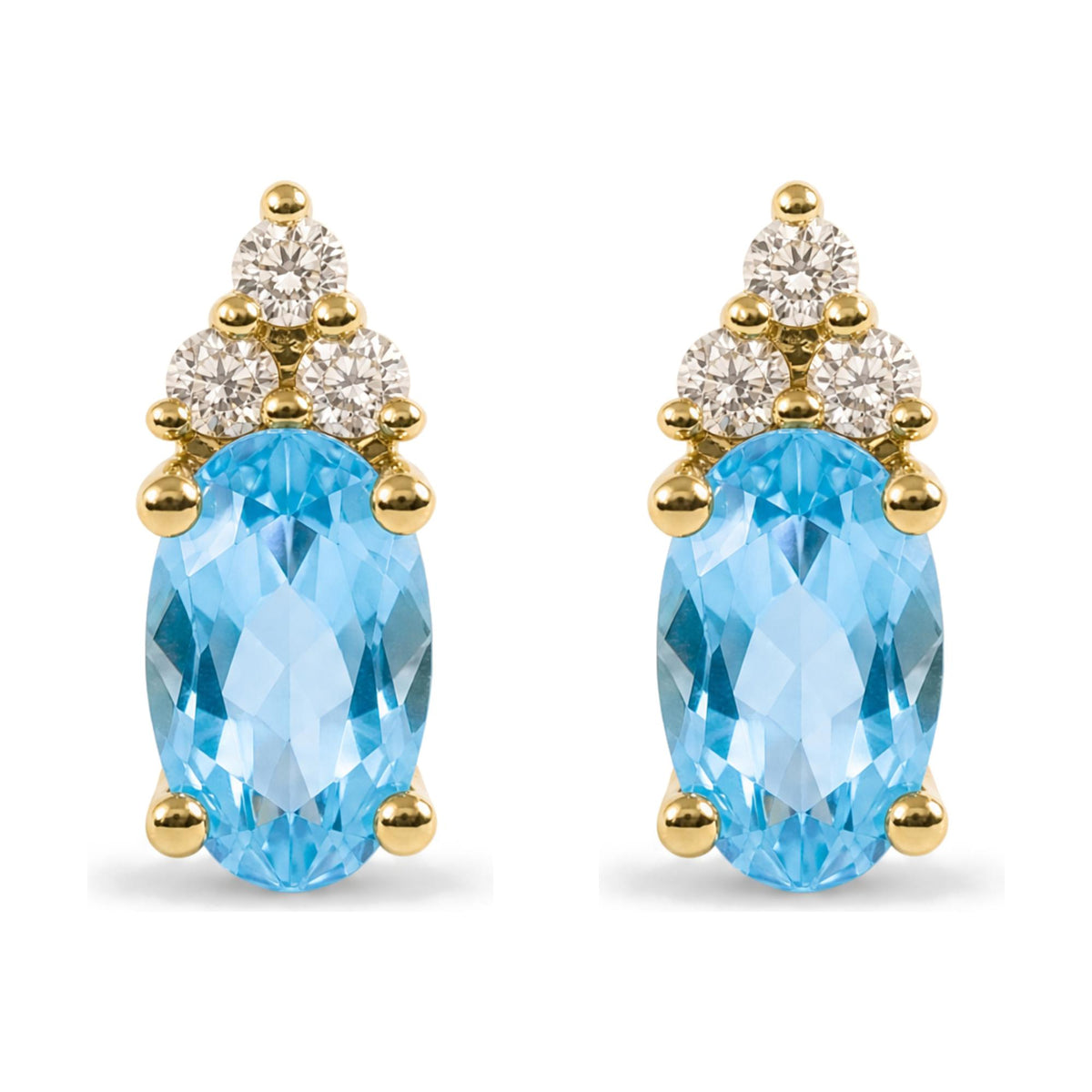 Close-up front view of a pair of yellow metal earrings featuring oval blue gemstones and round white gemstones in prong settings.