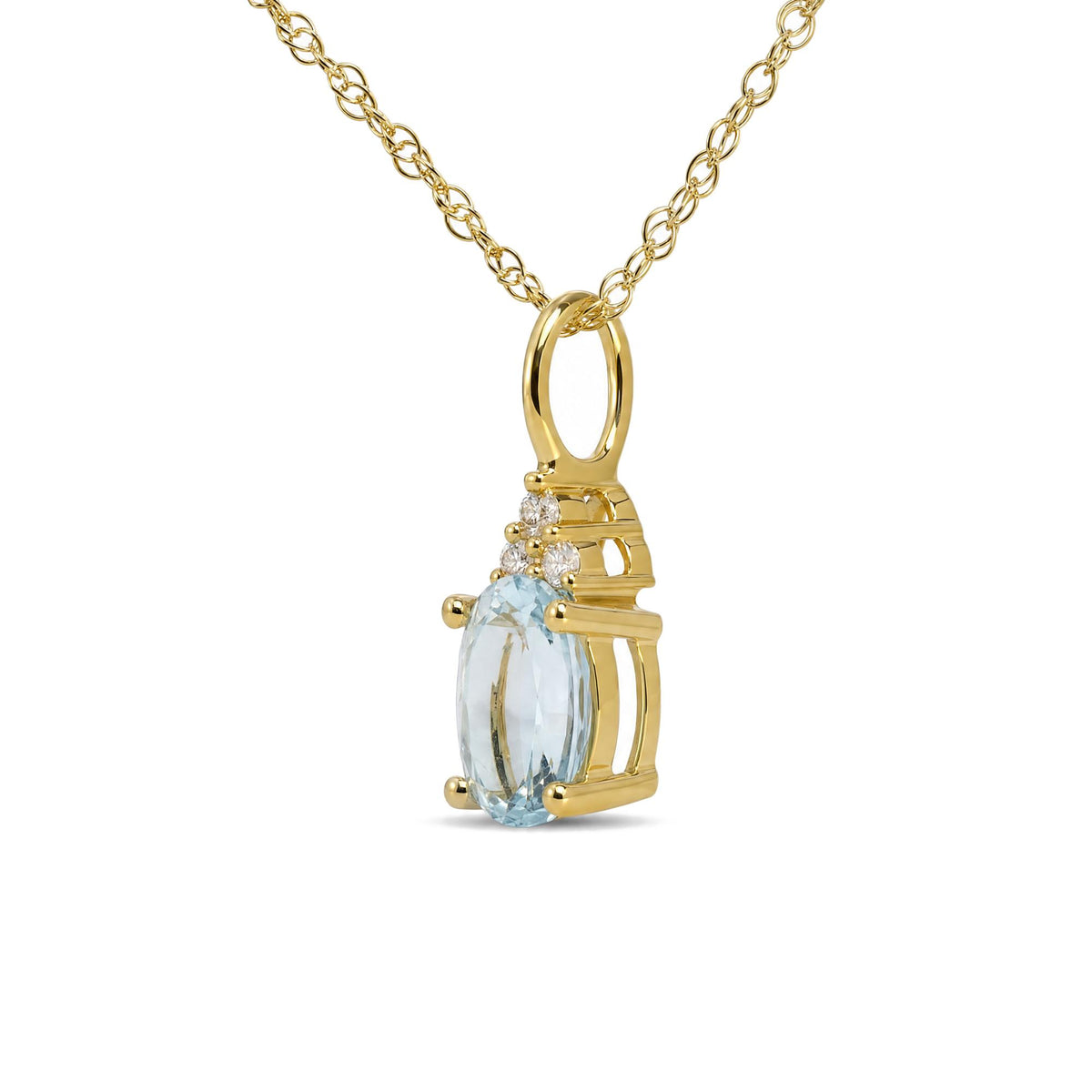 Close-up front view of a yellow metal necklace pendant featuring an oval blue gemstone in a prong setting, accented by round white gemstones in prong settings. The pendant hangs from a yellow metal chain.