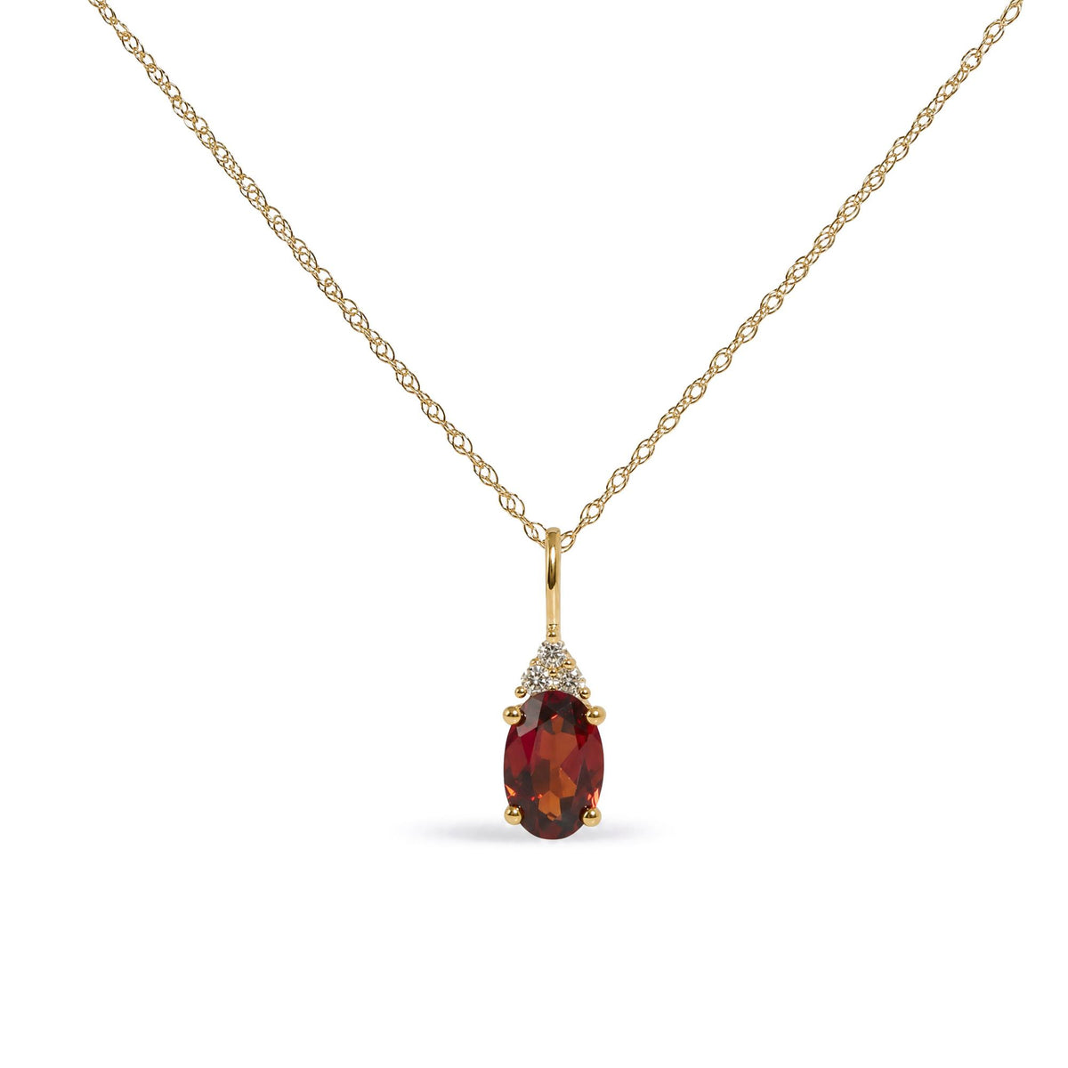 Close-up front view of a yellow metal necklace with a pendant featuring an oval red gemstone surrounded by three round white gemstones in prong settings.