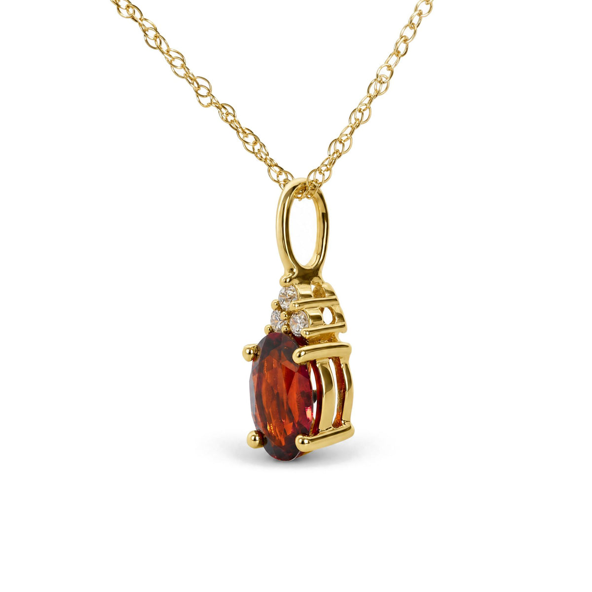 Close-up front angle of a yellow necklace with a pendant featuring an oval red gemstone surrounded by three round white gemstones in prong settings.