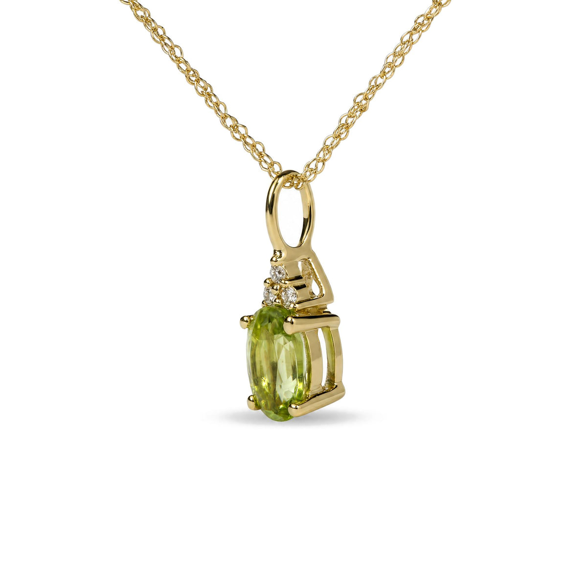 Close-up front view of a yellow metal necklace with a pendant featuring an oval green gemstone in prong setting, surrounded by three round white gemstones in prong settings.