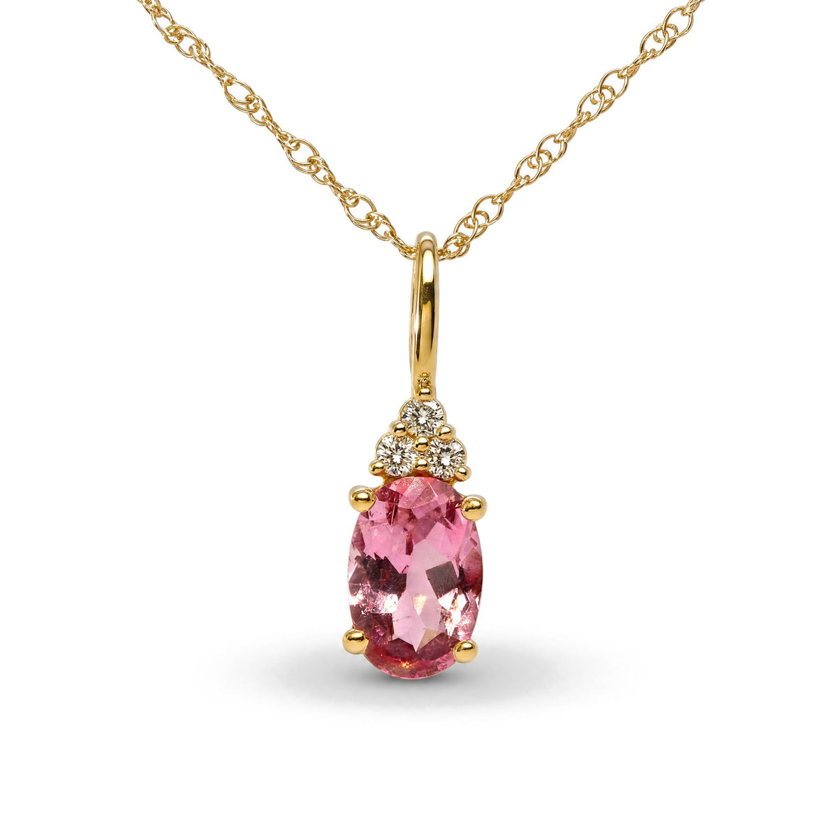 Close-up front view of a yellow metal necklace with an oval pink gemstone pendant accented by three round white gemstones above it, shown on a white background.