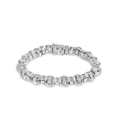 White metal bracelet with linked rounded rectangular segments set with multiple round white gemstones, shown from an angled top view on a white background.