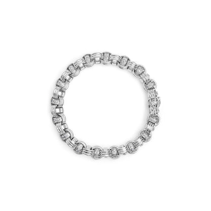 Top-down view of a white metal bracelet with linked segments, each set with round white gemstones in prong settings.