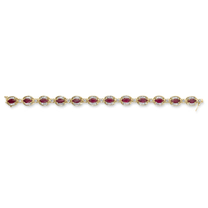 Yellow bracelet shown from above featuring alternating marquise-shaped red gemstones with four-prong settings and round white gemstones with bezel settings, accented by rows of baguette-shaped white gemstones in channel settings.