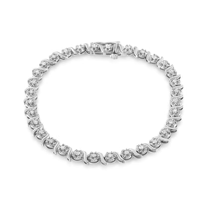 White metal bracelet with round white gemstones in prong settings, shown from a top flat lay angle.