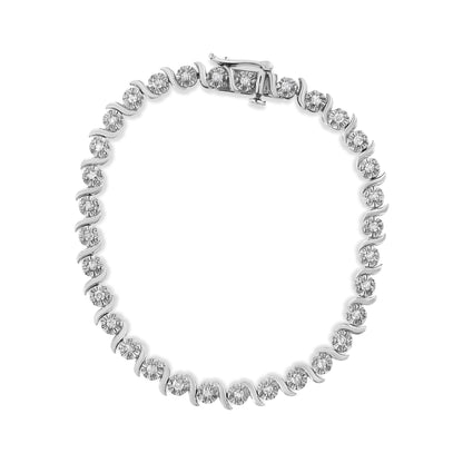 Top-down view of a white metal bracelet featuring round white gemstones in prong settings with a clasp.