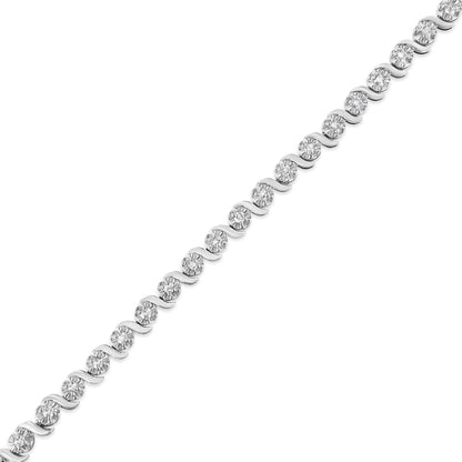 Diagonal close-up of a white metal bracelet featuring round prong-set white gemstones.