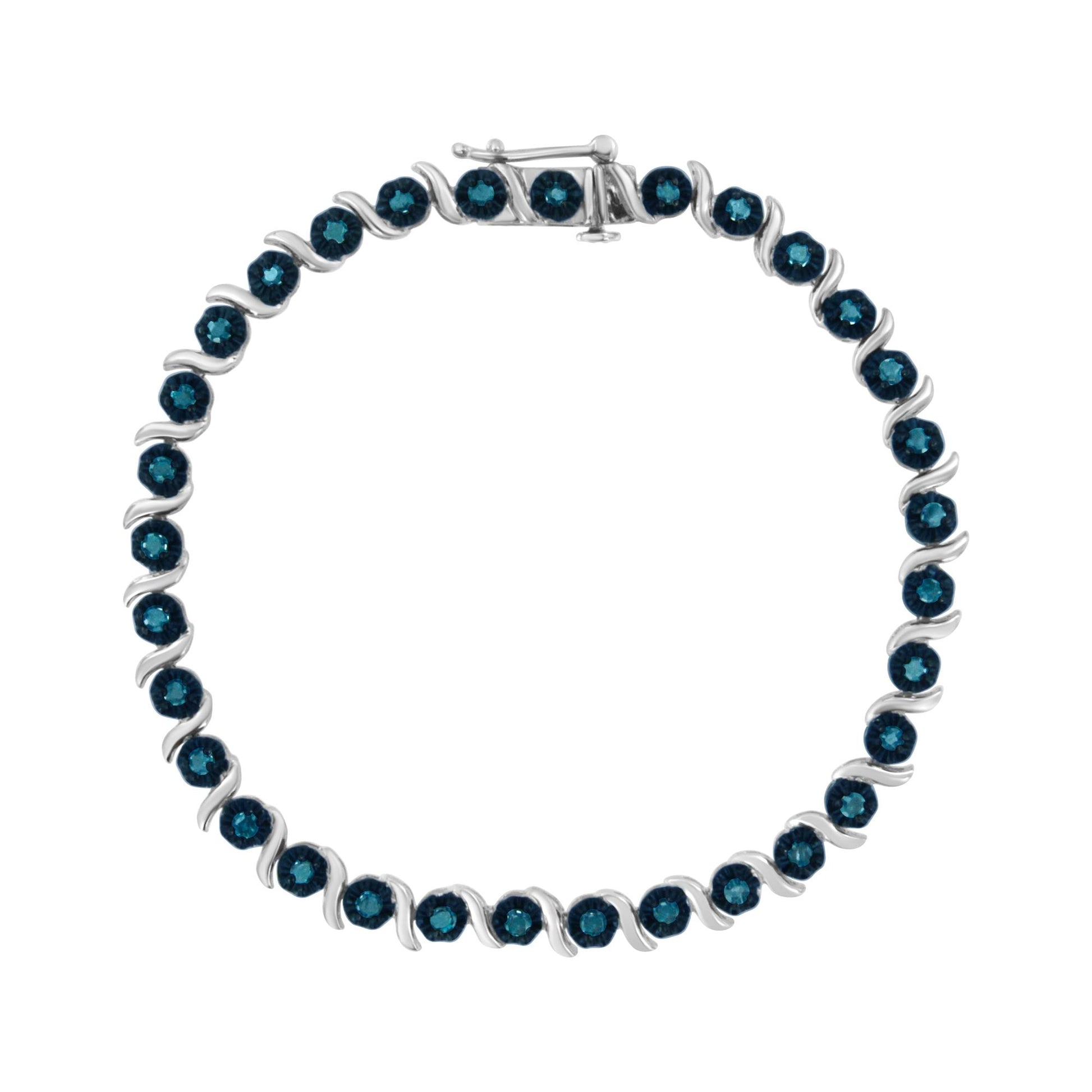 Top-down view of a white metal bracelet with round blue gemstones in prong settings, arranged in an alternating pattern.