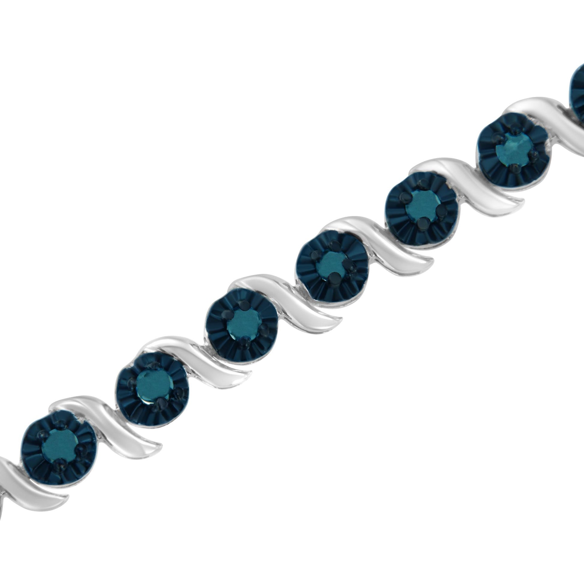 Close-up angled view of a white bracelet with alternating curved links and round blue gemstones in prong settings.