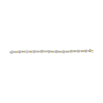 Bracelet with alternating yellow and white metal links featuring white baguette-shaped gemstones in channel settings, shown in a top-down view on a white background.