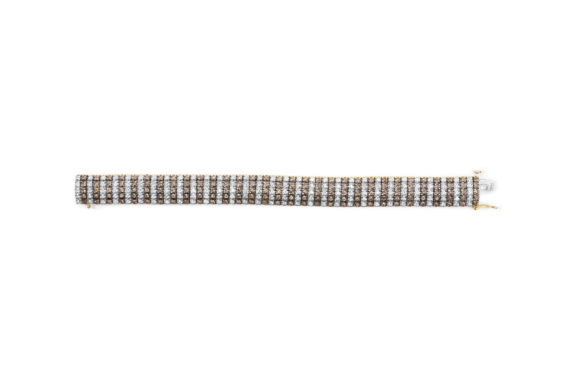 Close-up shot of a yellow metal bracelet laid flat, featuring alternating rows of round brown and white gemstones in prong settings.