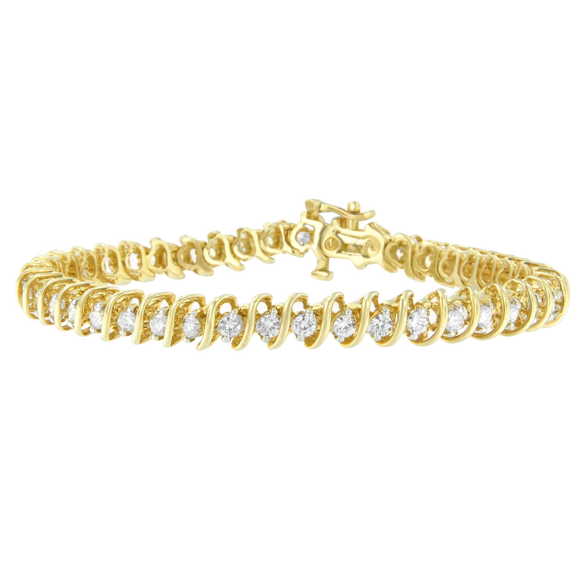 Yellow metal bracelet with prong-set round white gemstones, shown at an angled top view.