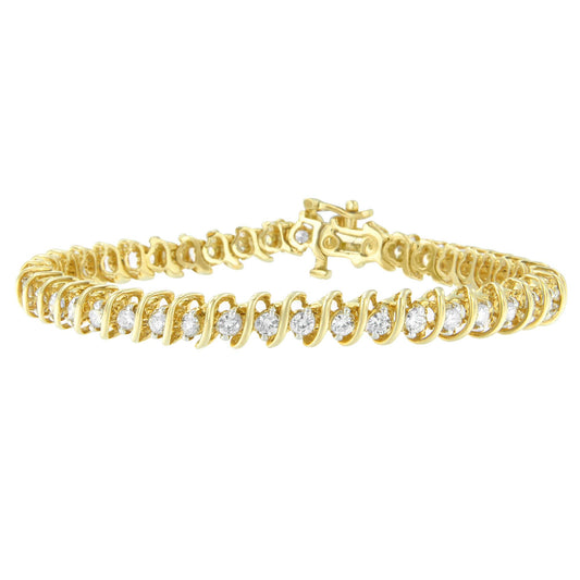 Yellow metal bracelet with prong-set round white gemstones, shown at an angled top view.