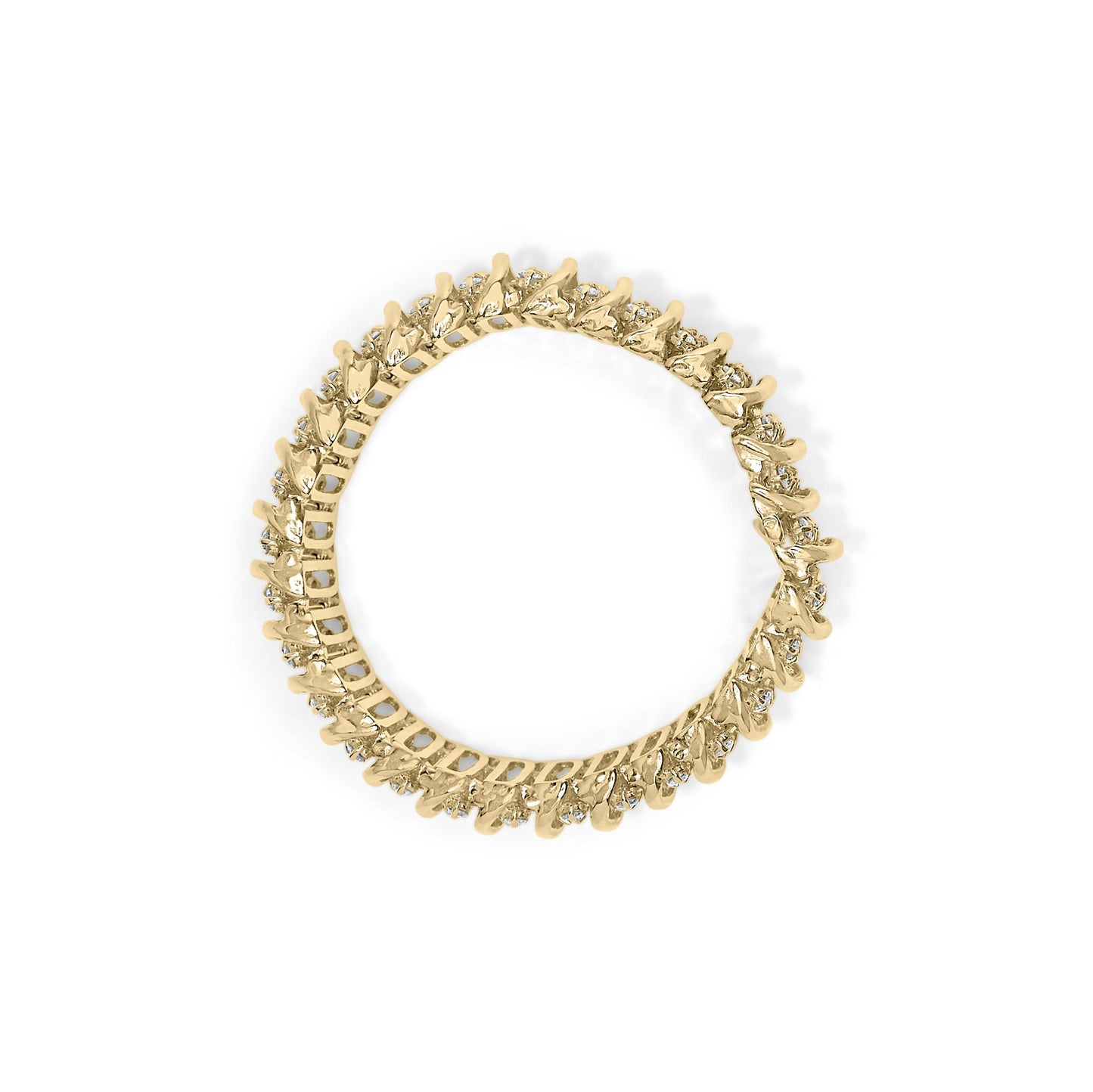 Top-down view of a yellow metal bracelet with round white gemstones in prong settings encircling the entire band.