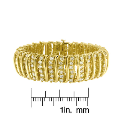 Yellow metal bracelet with multiple rows of round white gemstones in prong settings, shown from the front on a ruler for size reference.