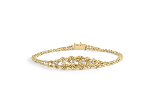 Yellow metal bracelet with a woven pattern and five round white gemstones in prong settings, shown from a front-facing angle on a white background.