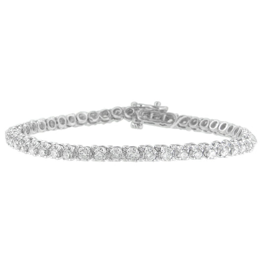 Close-up front angle of a white metal bracelet featuring round white gemstones in prong settings.