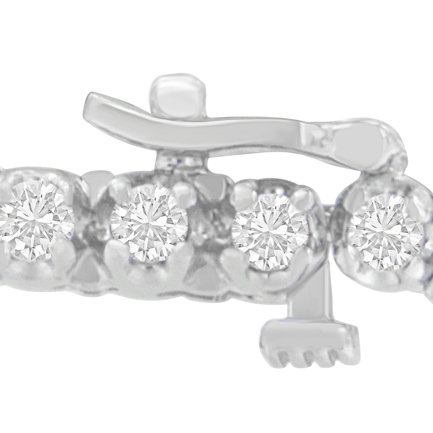 Close-up shot of a white metal bracelet clasp featuring round white gemstones in prong settings.