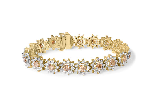 Yellow metal bracelet with alternating round champagne-colored and white gemstones in prong settings, shown from a slightly elevated front angle.