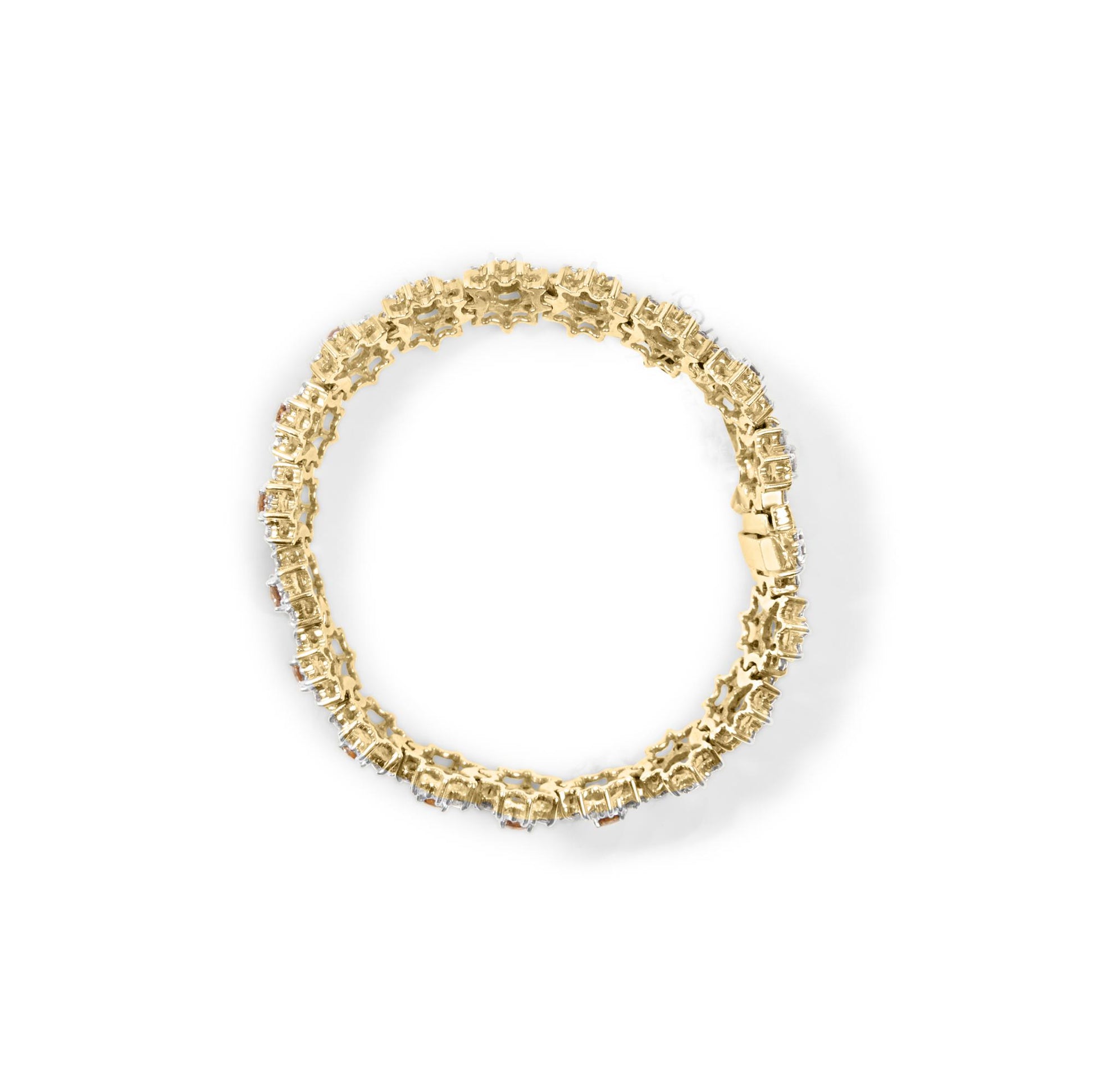 Top-down view of a yellow bracelet with round prong-set champagne and white gemstones.