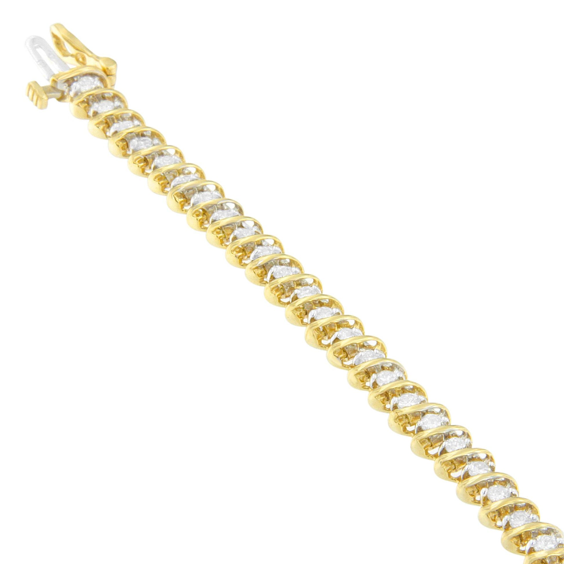 Yellow metal bracelet with prong-set round white gemstones, shown in a diagonal close-up angle.
