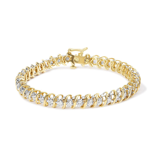 Yellow metal bracelet with round white gemstones in 2-prong settings, shown from a slightly elevated front angle.
