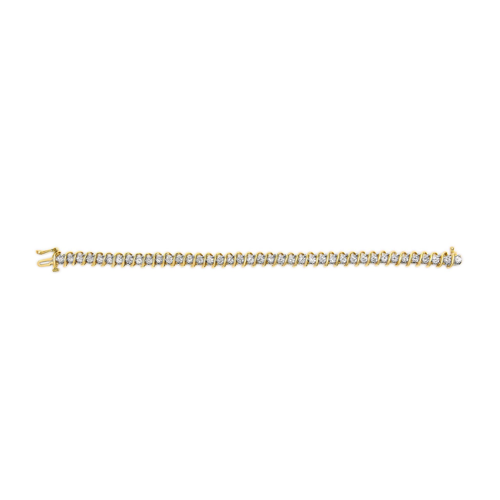 Yellow metal bracelet with round white gemstones in 2-prong settings, shown from a top-down angle.