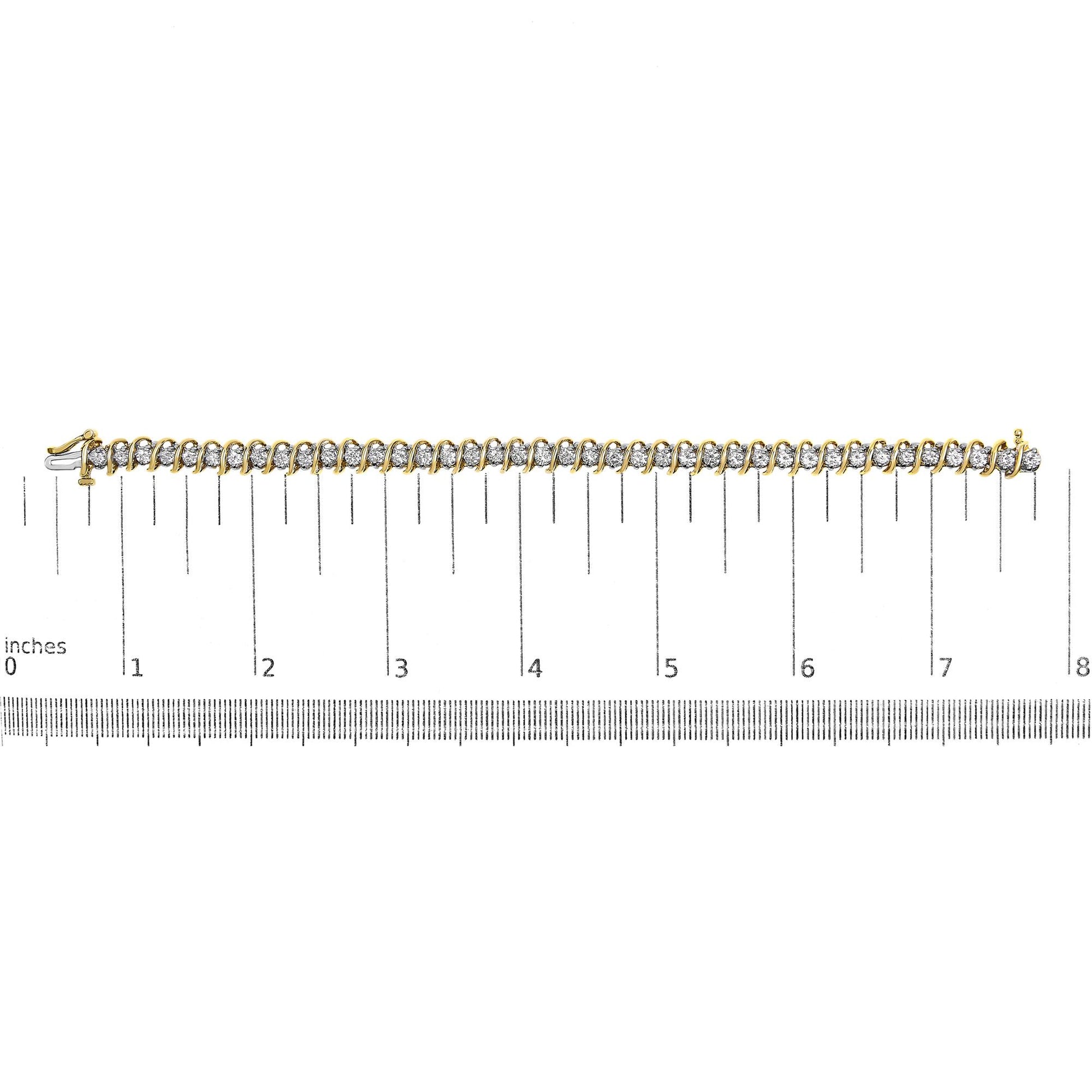 Yellow metal bracelet with round white gemstones in two-prong settings, laid flat on a ruler for size reference, top-down angle.