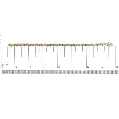 Bracelet with round white gemstones in prong settings arranged in a line, alternating with yellow metal links, shown on a ruler scale from a top-down angle.