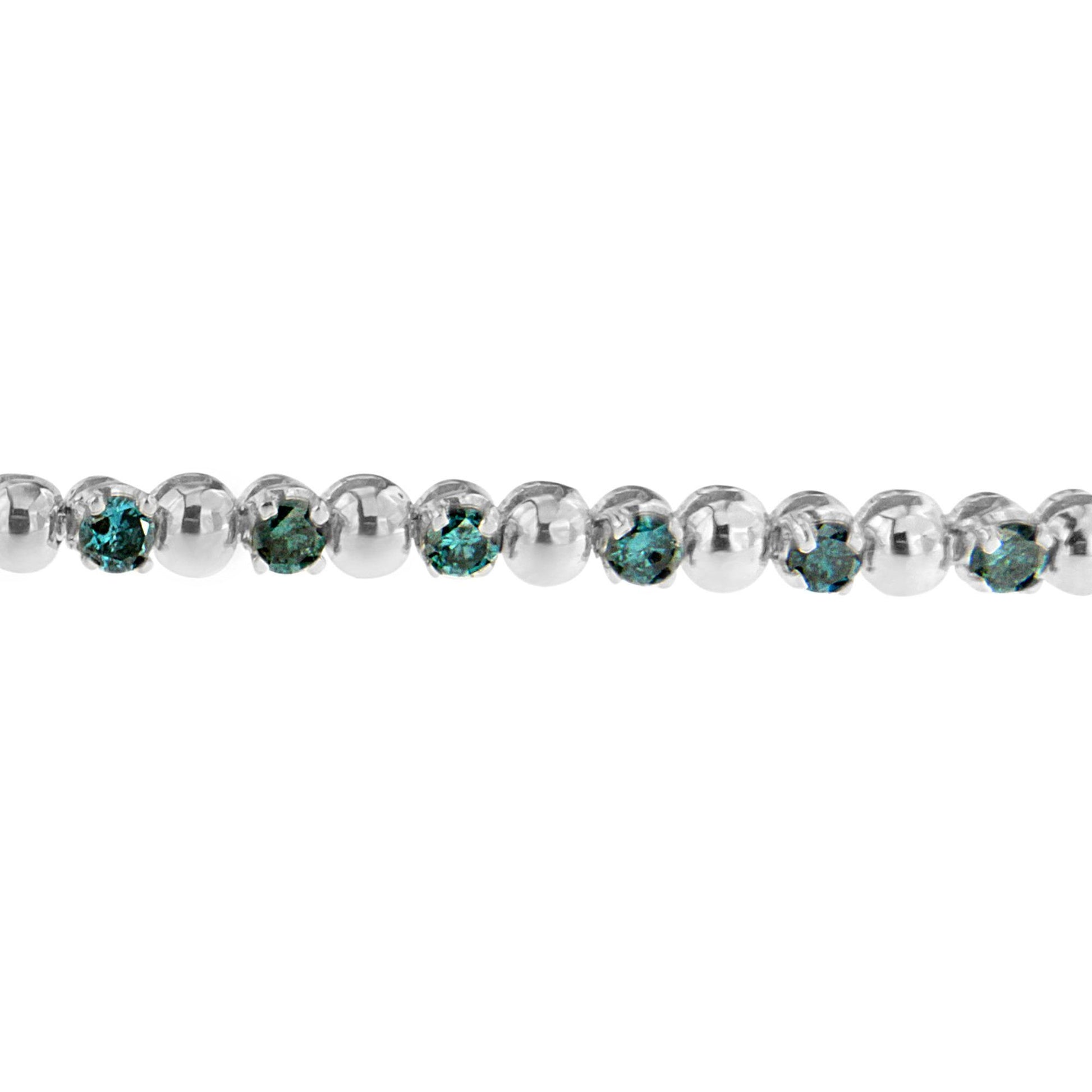 Close-up front view of a white bracelet featuring round blue gemstones in prong settings alternating with smooth round beads.