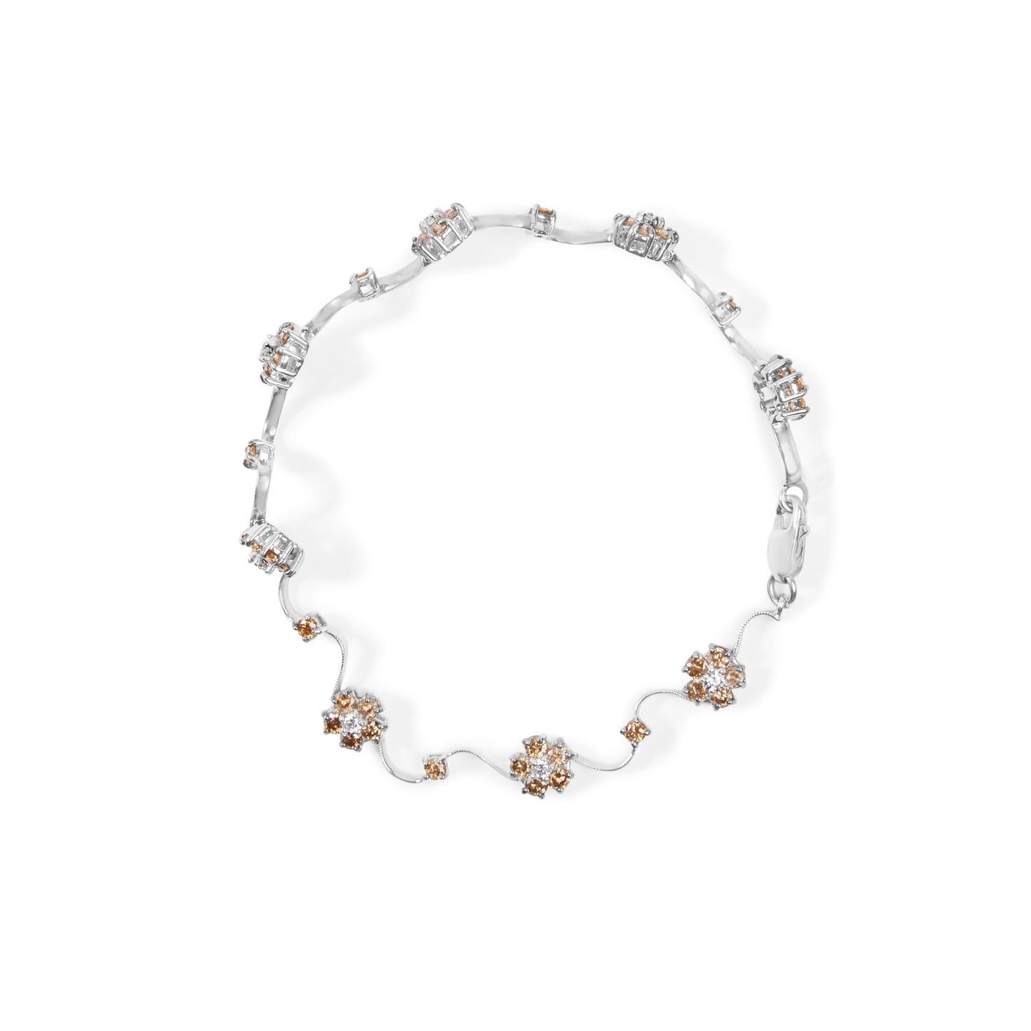 White metal bracelet with round white and champagne gemstones in prong settings, arranged in clusters and linked by thin metal strands, shown from a top-down angle.