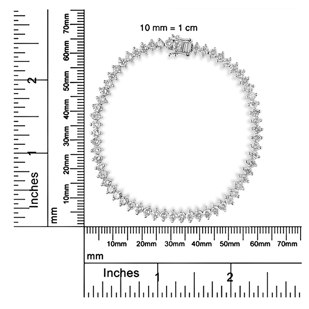 White metal bracelet with round white gemstones in 2-prong settings, photographed flat on a white background with rulers for size reference.