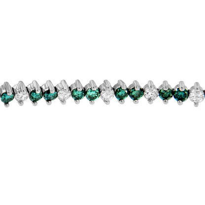 Close-up horizontal view of a white metal bracelet featuring alternating round white and blue gemstones in prong settings.