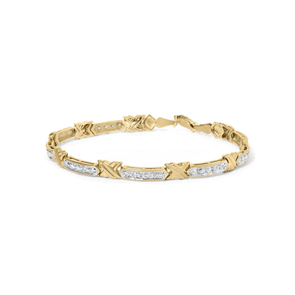 Yellow metal bracelet with round white gemstones set in prongs, shown from a slight side angle on a white background.