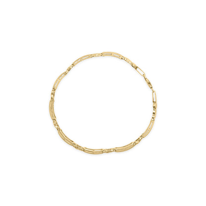 Yellow metal bracelet with alternating smooth and textured links, shown flat on a white background from a top-down angle.