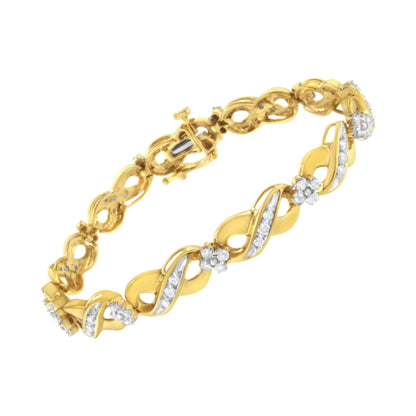 Yellow bracelet with intertwined design and white gemstones, shown at an angle.