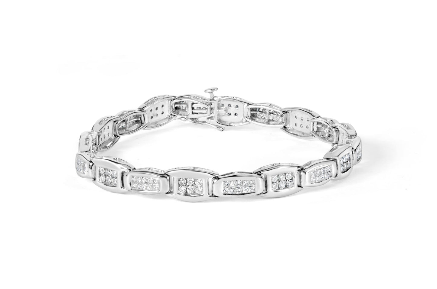 White metal bracelet with alternating rectangular links set with clusters of round and princess-shaped white gemstones, shown from a slightly angled top view.