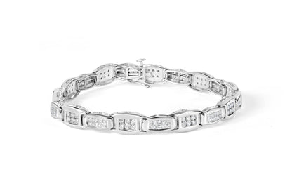 White metal bracelet with alternating rectangular links set with clusters of round and princess-shaped white gemstones, shown from a slightly angled top view.