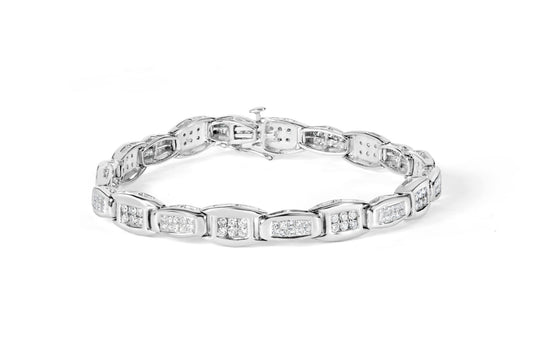 White metal bracelet with alternating rectangular links set with clusters of round and princess-shaped white gemstones, shown from a slightly angled top view.