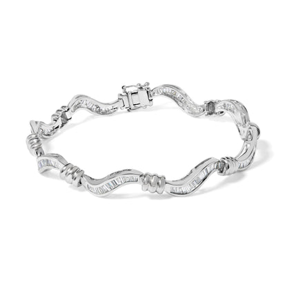 White metal bracelet with a wavy design featuring channel-set baguette-shaped white gemstones, shown from a top angle.