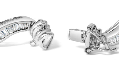 Close-up angled view of a white metal bracelet featuring baguette-shaped white gemstones set in a channel setting, showing the clasp mechanism.