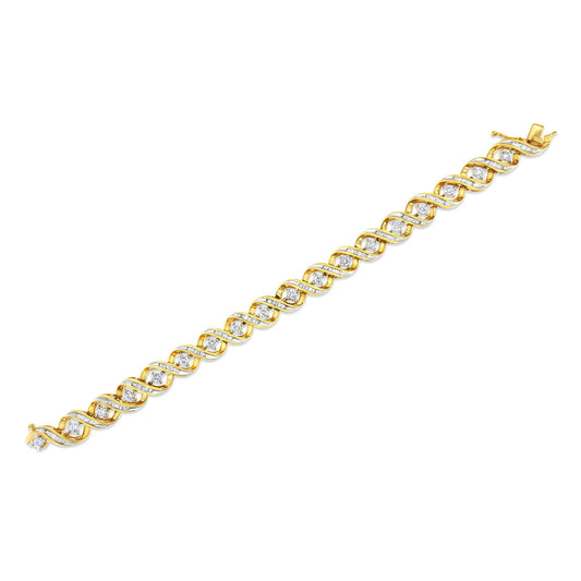 Top-down view of a yellow bracelet featuring alternating round white gemstones in prong settings and baguette white gemstones in channel settings.