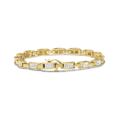 Yellow metal bracelet with rectangular links set with white gemstones in invisible setting, shown from front angle on white background.