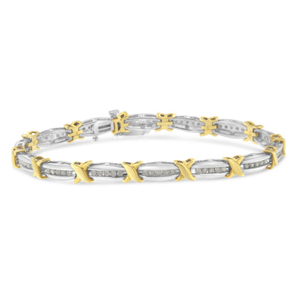 Close-up front angle of a two-tone bracelet with alternating yellow and white metal links featuring round white gemstones set in a channel setting.