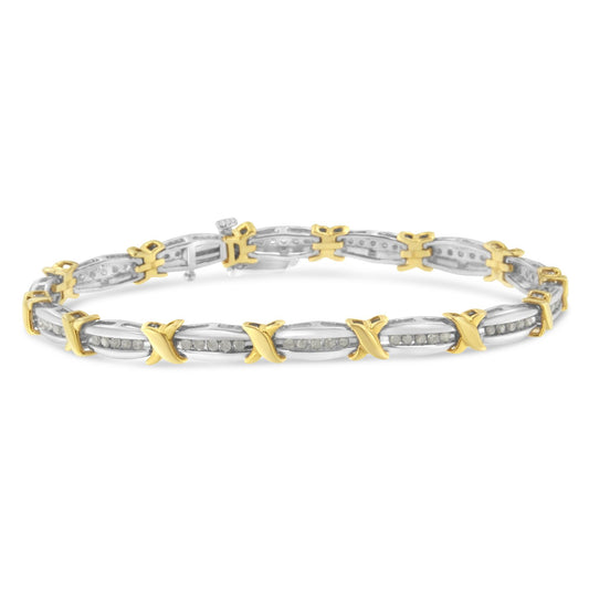 Close-up front angle of a two-tone bracelet with alternating yellow and white metal links featuring round white gemstones set in a channel setting.