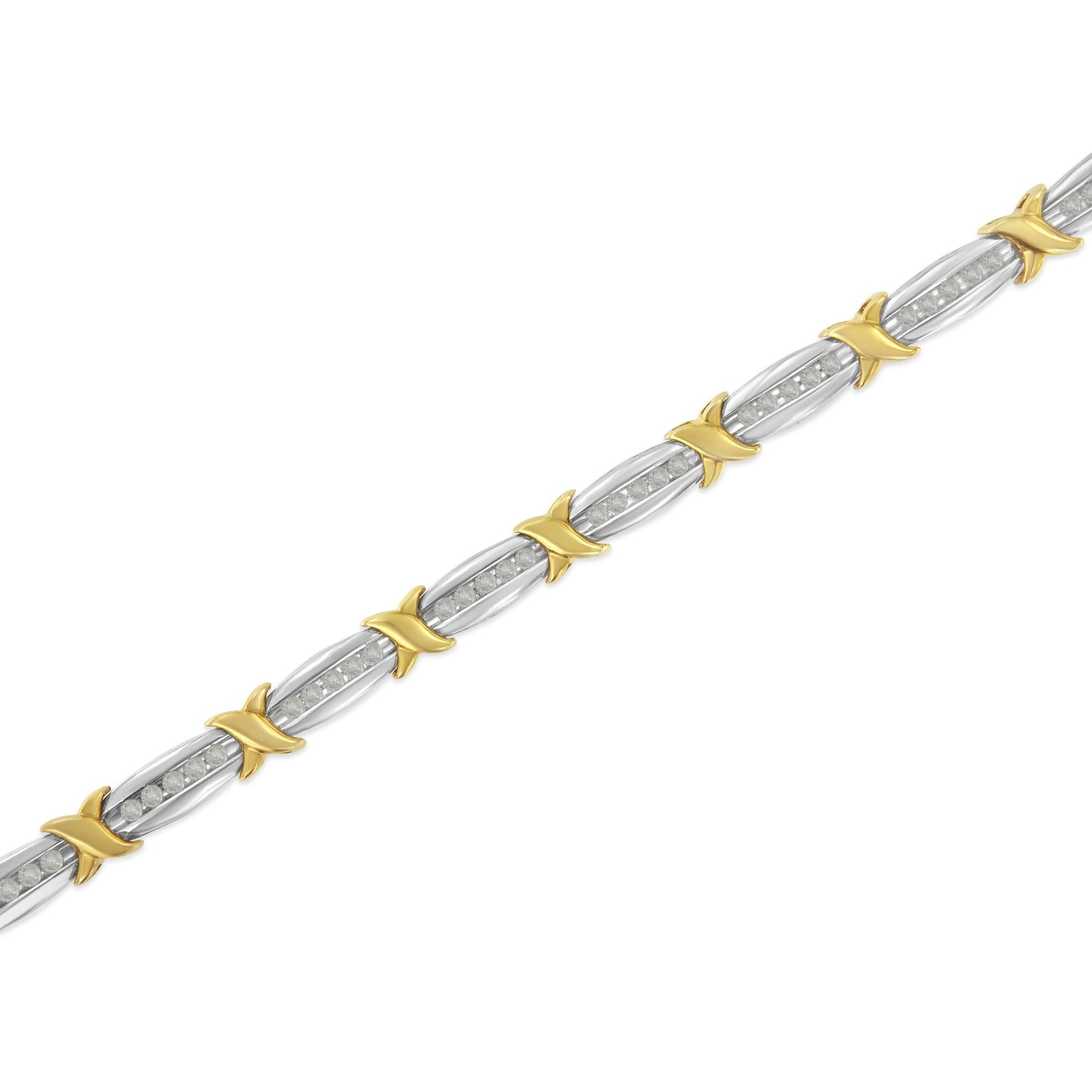 Diagonal close-up of a bracelet with alternating yellow and white metal links, each white metal section set with white round gemstones in a channel setting.