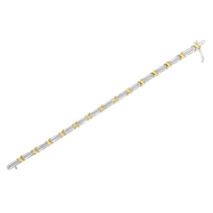 Bracelet with alternating yellow and white metal links, white gemstones in channel setting, shown flat at a slight diagonal angle.