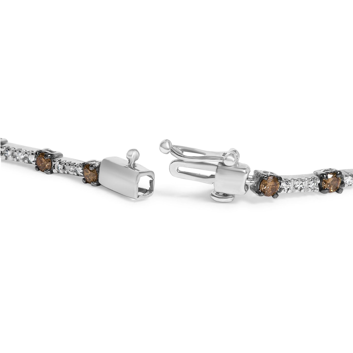 Close-up front angle of white metal bracelet with prong-set round champagne and white gemstones and a box clasp.