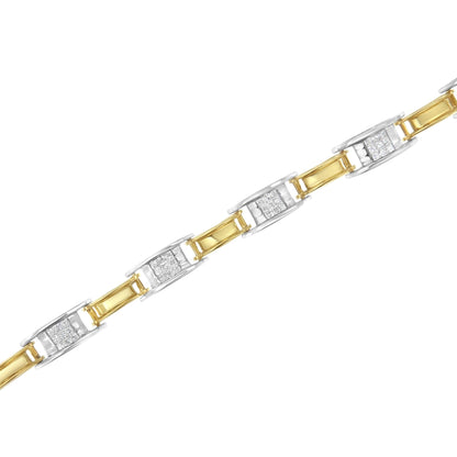 Diagonal close-up of a two-tone bracelet with alternating yellow and white links, white links set with clusters of square white gemstones in channel settings.
